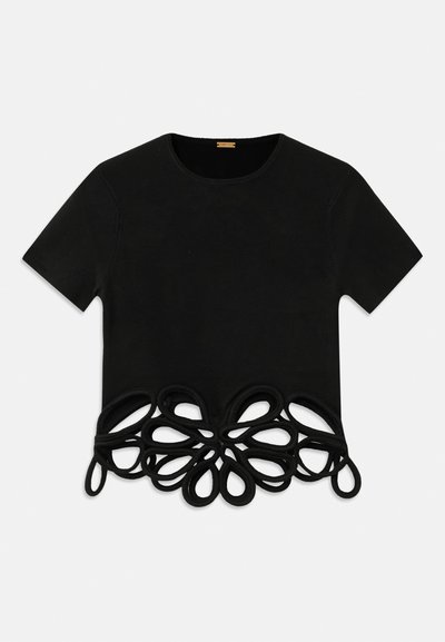 Black short-sleeve t-shirt made from soft fabric, featuring a decorative looped trim at the hem, creating a floral pattern.