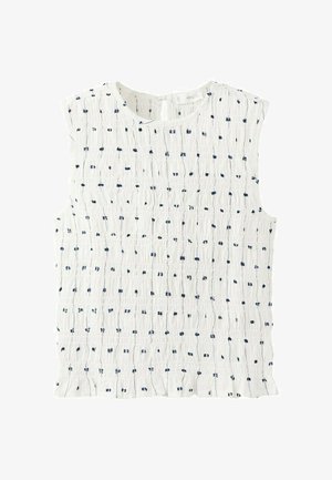 Blusa bianca senza maniche con piccoli puntini ricamati blu navy e tessuto lavorato a trama rugosa.