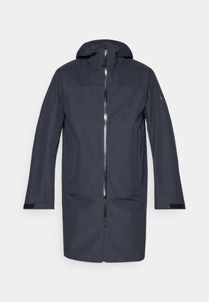 Navy blue long waterproof jacket with hood, front zipper, side pockets, and adjustable wrist straps.