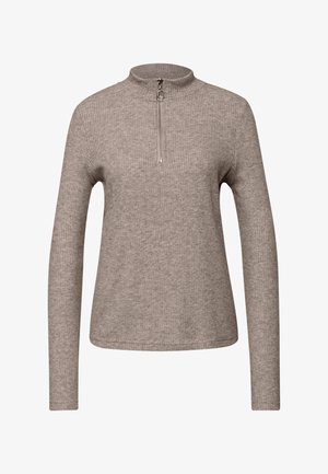 Grå ribbad långärmad topp med hög krage och en halv dragkedja vid halsen. Mjuk textur och åtsittande design.