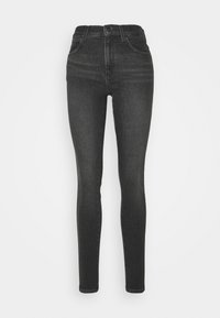 Jeans skinnies negros de denim con cintura alta. Cuenta con cinco bolsillos, pasadores para cinturón y detalles de costura mínimos. Textura suave.