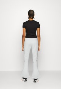 Nike Sportswear TREND - Calças de fato de treino - photon dust