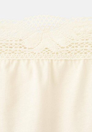 Cremefarbener Stoff mit kunstvoller Spitzenborte, die florale und Netzmuster entlang der oberen Kante aufweist.