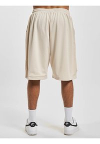 DEF PRINT  - Jogginghose - beige