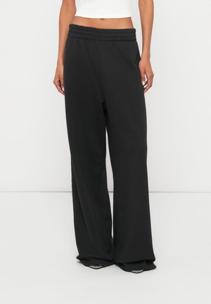 ZENIA - Pantalon de survêtement - black
