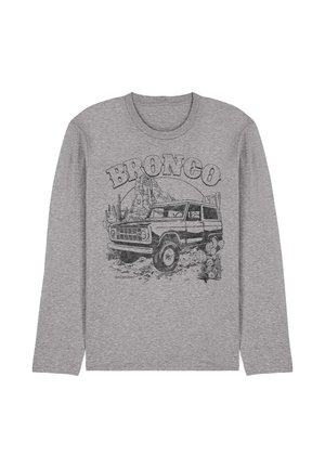 Graues Langarmshirt mit einem Vintage-Schwarzgrafik eines Bronco-Fahrzeugs, das abseits der Straße zwischen Wüstenskakteen und Felsformationen fährt.