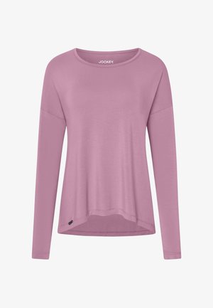 Långärmad topp i ljusrosa tyg, med rund hals, avslappnad passform och sluttande nederkant med en liten etikett på sidan.