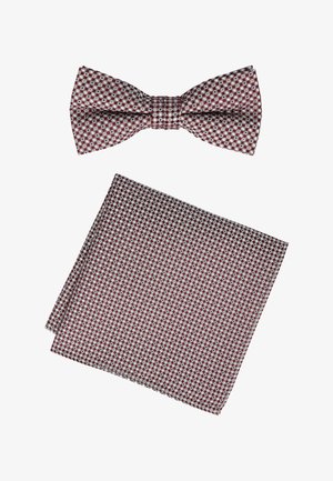 Maroon and white checkered bow tie with matching square pocket handkerchief, both featuring a geometric pattern.