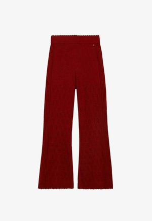 Pantalon large en maille rouge avec un motif texturé, taille élastique et bords d'ourlet festonnés.