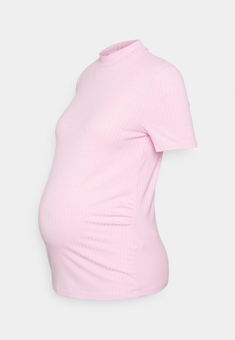 T-shirt de maternidade rosa canelado com um decote alto, mangas curtas e franzidos laterais para um ajuste confortável. Tecido macio e elástico que se adapta a uma barriga em crescimento.