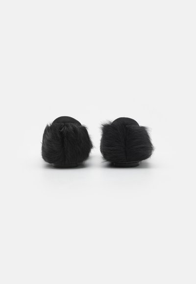 Black faux fur slippers with a rounded design, featuring soft, fluffy texture on the back, and flat soles for comfort and stability.