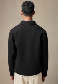 Next TRUCKER - Välikausitakki - black