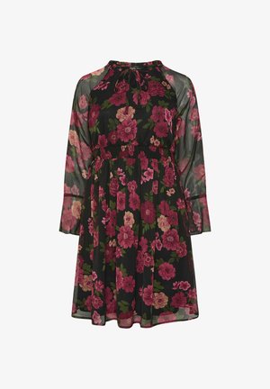 Mustakukkainen mekko pitkillä läpinäkyvillä hihoilla, jossa on suuria vaaleanpunaisia ja purppurakukkia, kerrotettu vyötärö ja pyöreä pääntie, jossa on nauhakoriste.