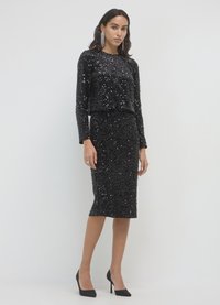 Calliope COPRISPALLE CON PAILLETTES  - Camicetta - nero