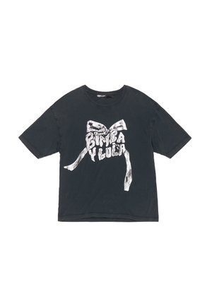 Zwarte katoenen t-shirt met een losse pasvorm en korte mouwen, met een witte grafische ontwerpen van een strik en de tekst "BIMBA Y LOLA".
