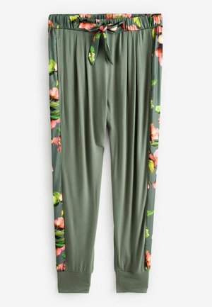 Groene broek met bloemen zijpanelen, met een tunnelkoord in de taille en een zachte textuur. Boorden bij de enkels zorgen voor een smal gesneden pasvorm.