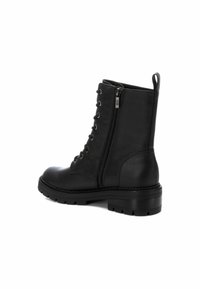 XTI Botines con cordones - black