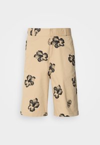Béžové šortky s čiernym kvetinovým vzorom hibiscus. Obsahujú elastický pás a logo detail na dolnej strane. Vyrobené z ľahkého materiálu.