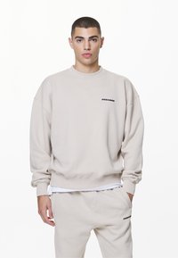 Pegador LOGO OVERSIZED SWEATER - Felpa - washed dust cream