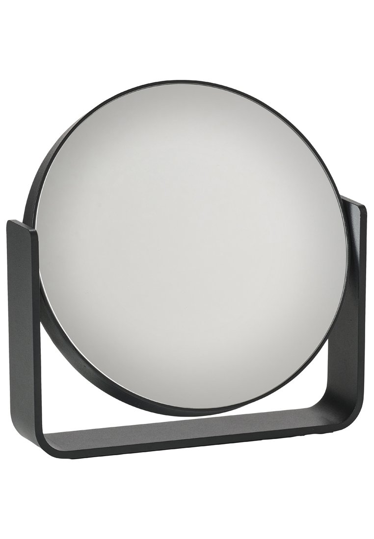 Miroir rond avec un cadre en métal noir élégant. La base présente un design minimaliste, offrant stabilité et esthétique moderne.