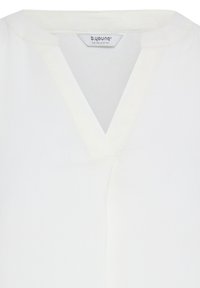 White blouse with a V-neckline and a small collar, featuring a fabric tag labeled "b.young THE COLLECTION" inside the neckline.