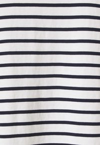 White fabric with evenly spaced navy blue horizontal stripes. Soft texture, lightweight material, and uniform width stripes throughout.