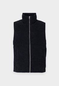 Marineblauwe corduroy puffer vest met hoge kraag, rits aan de voorkant en twee voorzakken. Heeft een gestructureerd ribbelpatroon.