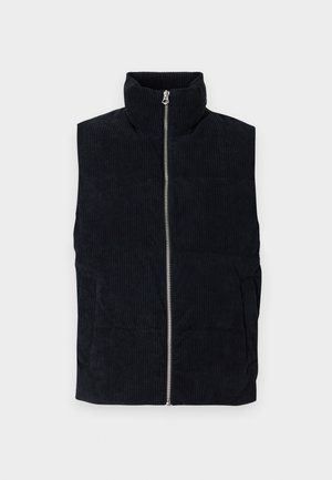 Vest puffer din corduroy navy cu guler înalt, fermoar frontal și două buzunare frontale. Prezentă un model texturat cu dungi.