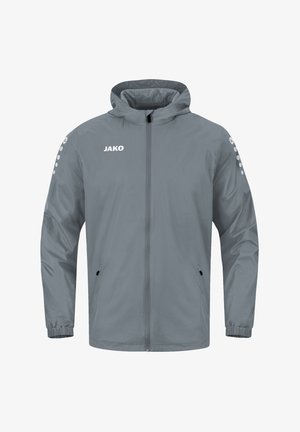 Gray windbreaker jacket with a front zipper, two side pockets, elastic cuffs, and "JAKO" logo on the chest. Smooth, lightweight material.