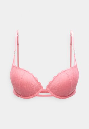 Soutien-gorge en dentelle rose avec bord festonné et motif géométrique, doté de bretelles réglables et d'une texture lisse. Design balconnet.