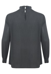 Blusa a maniche lunghe, grigio scuro, in un tessuto leggero con collo alto, dettaglio a chiave sulla schiena e polsini con bottoni. Finitura testurizzata su tutta la superficie.
