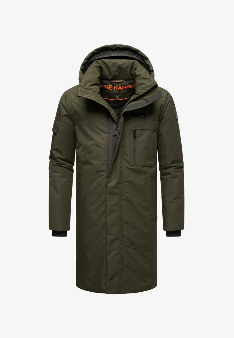 Olivroheline isoleeritud jope kapuutsiga, ees tõmblukk ja mitu tõmblukuga taskut. Omab musti varrukaid ja kontrastset oranži sisemist voodrit.