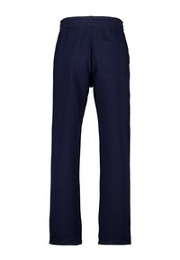 Pantalones de chándal azul marino con un corte relajado, cinturilla elástica y un bolsillo trasero. Fabricados con un material suave y de textura lisa.