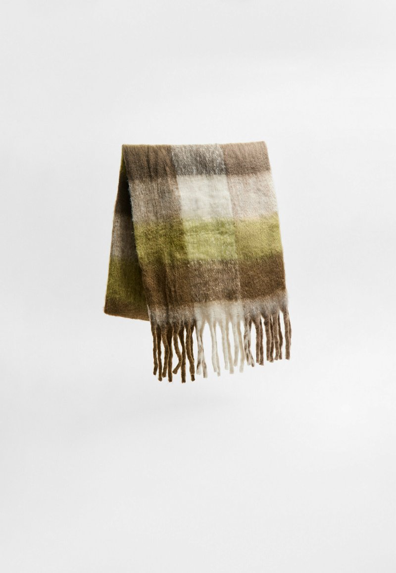 Sciarpa in plaid di lana in tonalità terrose di marrone, verde e crema. Presenta dettagli di frange ai bordi e una finitura morbida e testurizzata.
