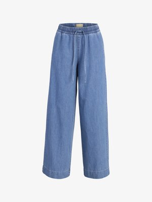 Pantalon en jean bleu clair à jambes larges avec ceinture élastique et fermeture à cordon à l'avant.