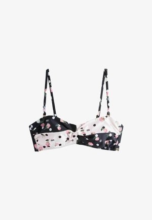 Soutien-gorge floral noir et blanc avec fines bretelles réglables, motifs de roses roses et petits pois.