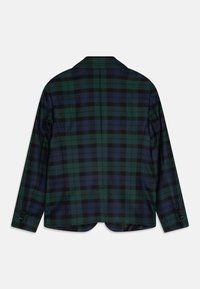 Grüne und marineblaue Karojacke mit einem strukturierten Kragen, schwarzen Knöpfen und einer glatten Textur. Verfügt über einen abgerundeten Saum und lange Ärmel.