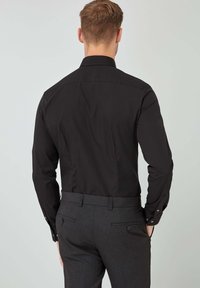 Next Business skjorter - black