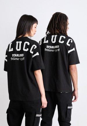UNISEX - T-shirts med print - schwarz