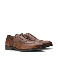 Brown leather dress shoes with a brogue design, featuring perforated detailing and a rounded toe. Laces and a low heel complete the look.