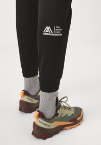 The North Face PANT - Treniņtērpa apakšdaļas - black