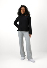 Champion EMOTIONAL DANCE HIGH NECK OPEN SHOULDER - Mikina - schwarz