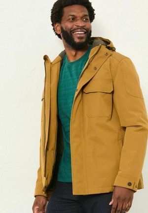 REGULAR FIT - HOODED WATERPROOF - Regenjacke / wasserabweisende Jacke - dark yellow
