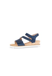 Diepblauwe sandalen met kruisbandjes, met een ribbeltextuur, kurken wiggenhak en witte rubberen zool.