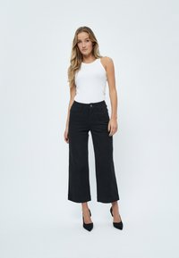 Desires DEFLORENCE PANTS - Bootcut-farkut - black