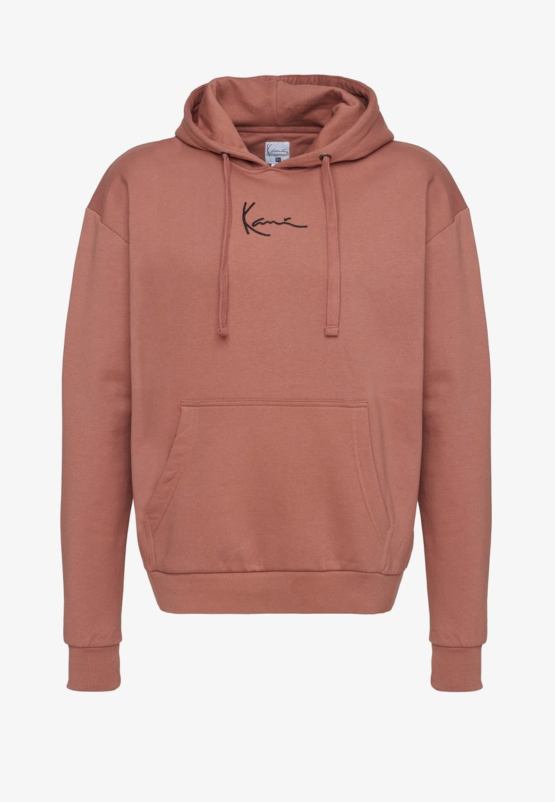 Sweat à capuche rose poussiéreux avec poche ventrale, capuche à cordon, poignets et bord côte, et logo en cursive noir centré sur la poitrine.
