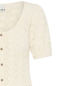 Cardigan tricoté ivoire à manches courtes avec motif en dentelle ouverte, encolure ronde et boutons marron sur le devant.