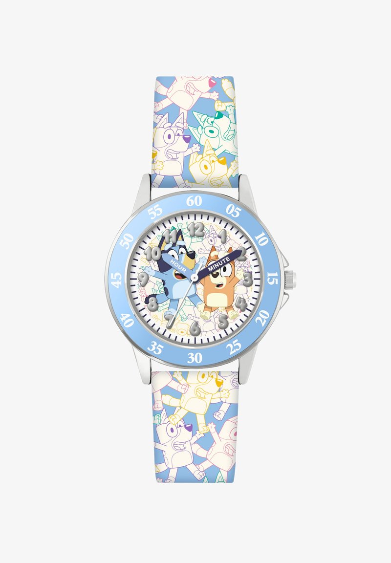 Orologio per bambini con cassa in argento, lunetta blu e cinturino in silicone decorato con cani in cartone animato dai colori pastello. Quadrante bianco con indicatori delle ore e dei minuti.