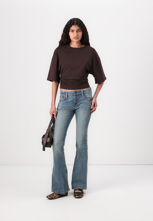 FLAME TWIST - Flared Jeans - turquoise dust2