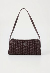 Brown quilted leather handbag with a single shoulder strap, featuring a zip closure and a small metallic logo detail at the front.